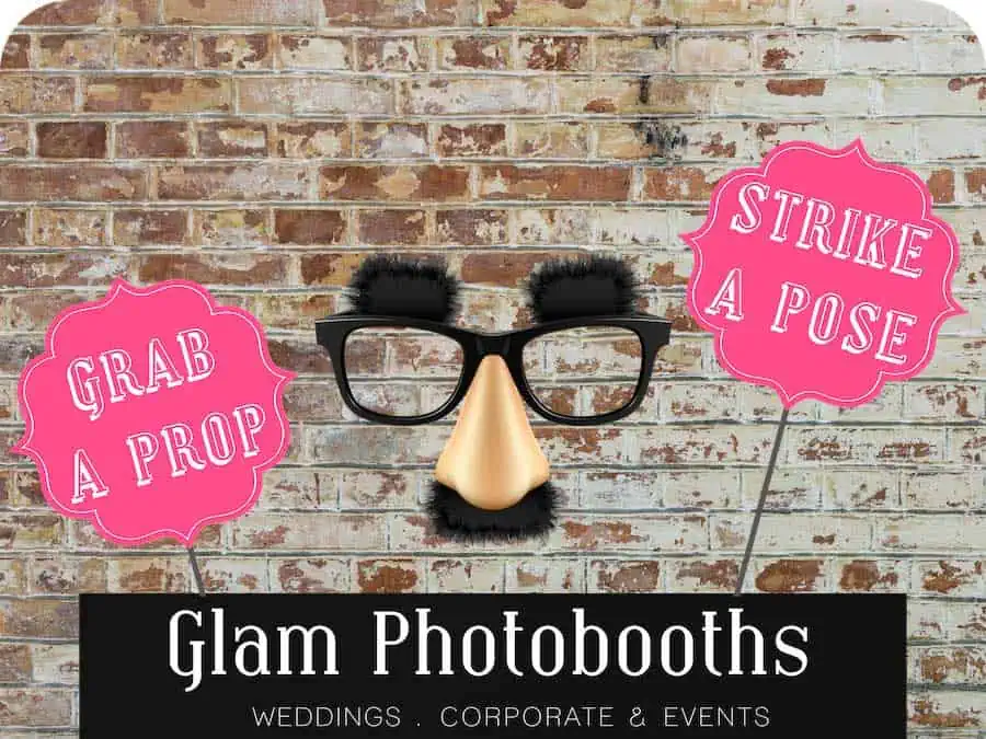 Rustic Brick Wall Photo Booth Backdrop with Glam Photobooths Logo