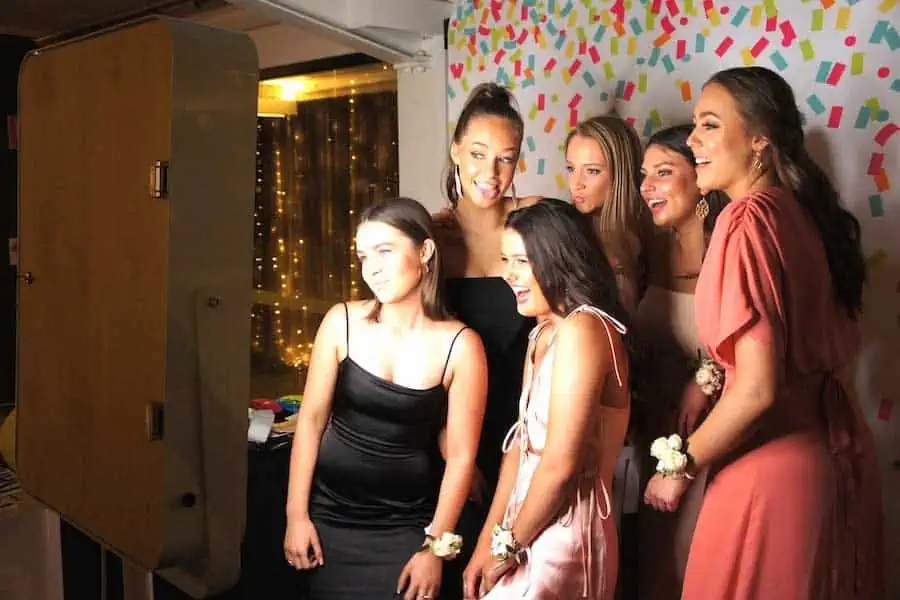 Glam Photobooths - Girls posing for a photo at an event
